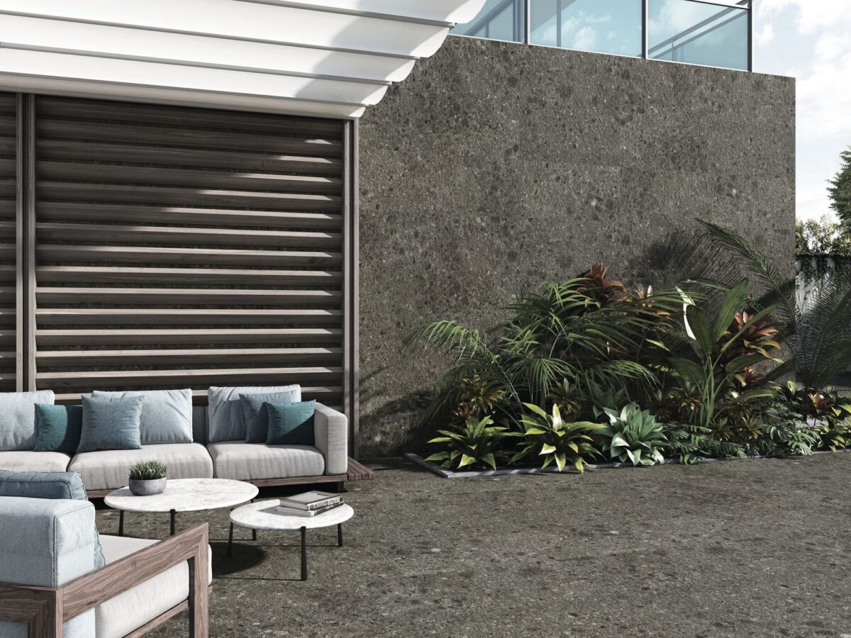 Mur de terrasse habillé d'un carrelage extérieur mural effet pierre
